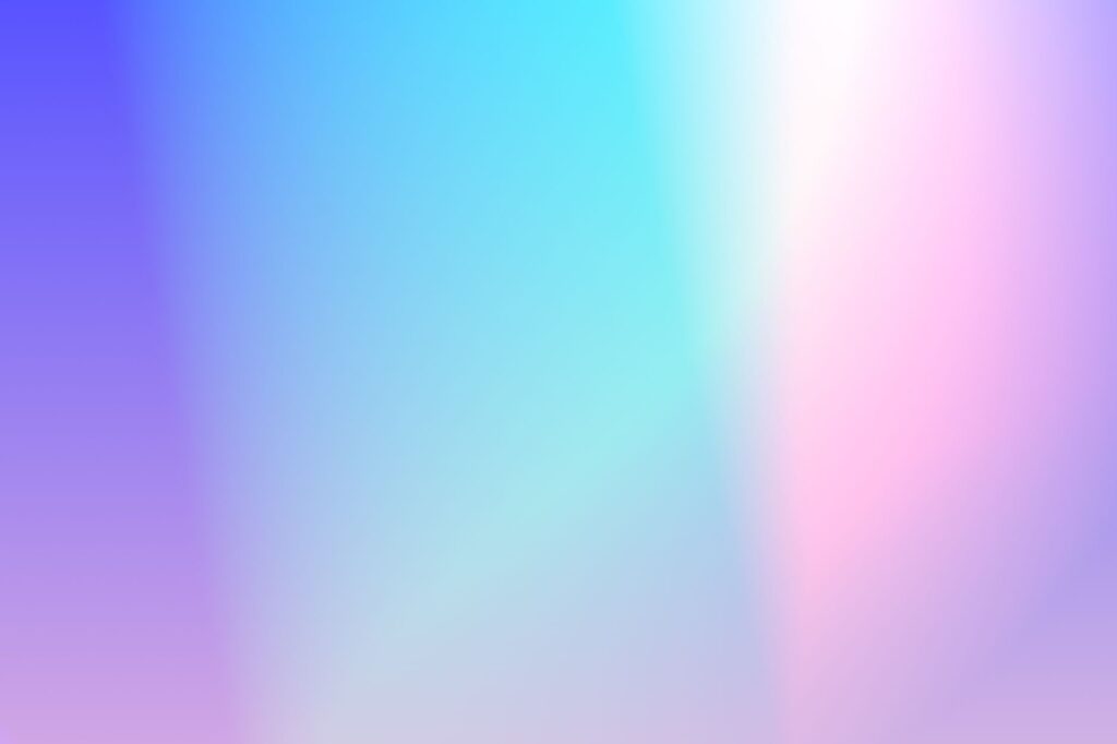 Vibrant multicolor gradient background with soft pink, purple, and blue hues.
